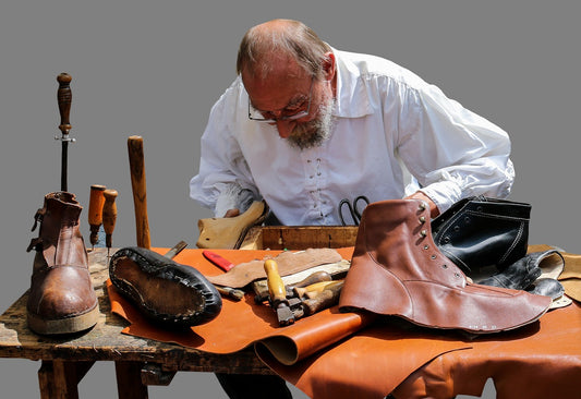 man making leather shoes - DAGGA