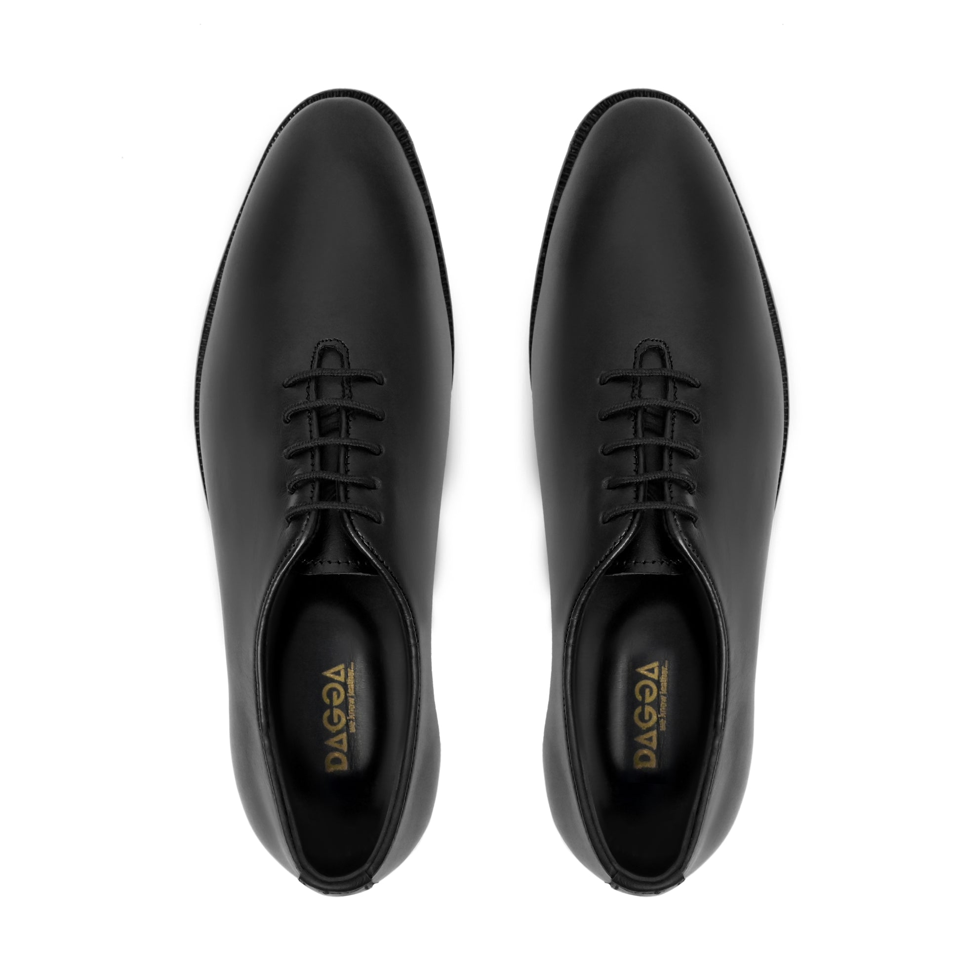 Dagga Pair of black dress shoes on a white background