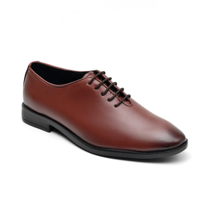 Brown leather dress shoe on a white background