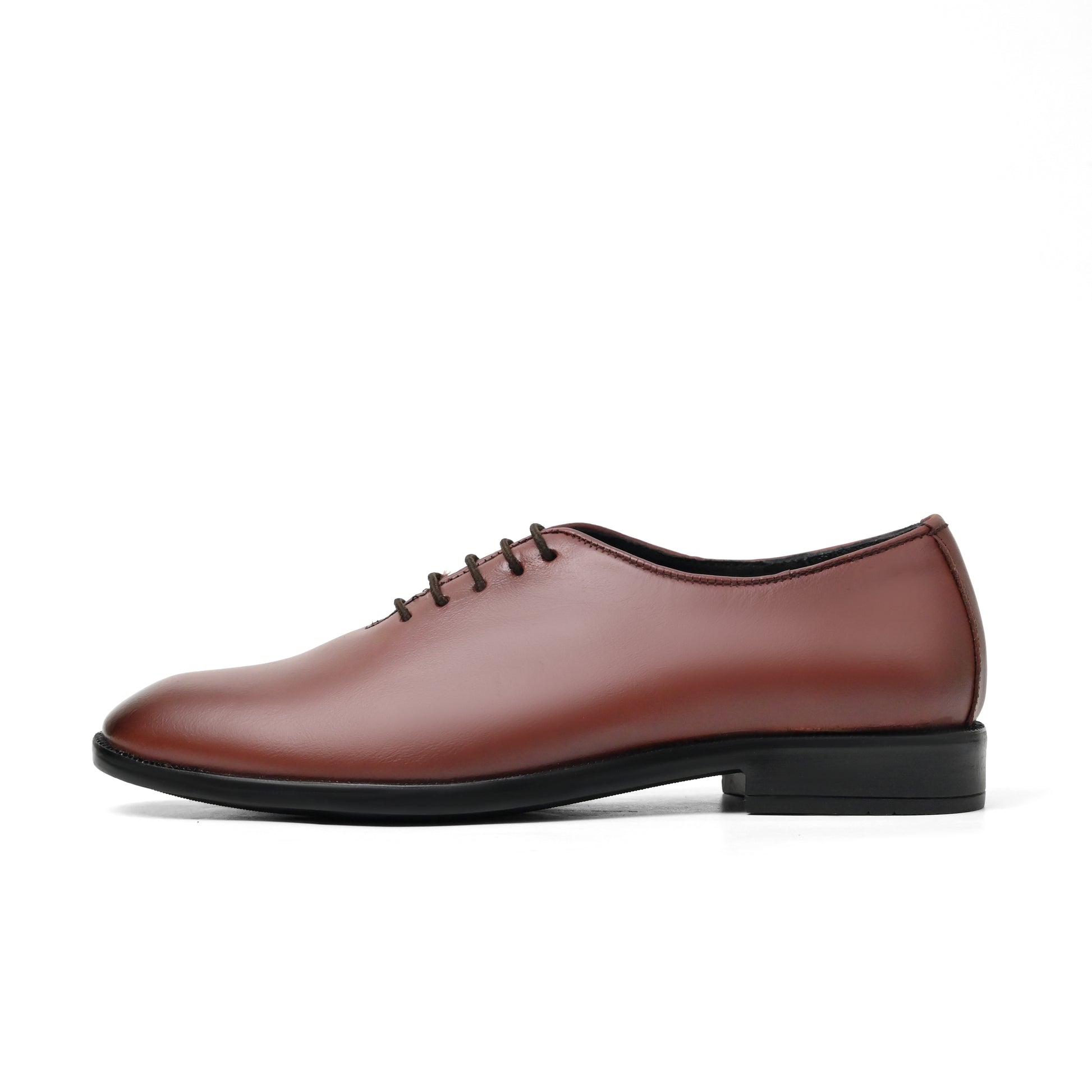Dagga Brown leather shoe on a white background